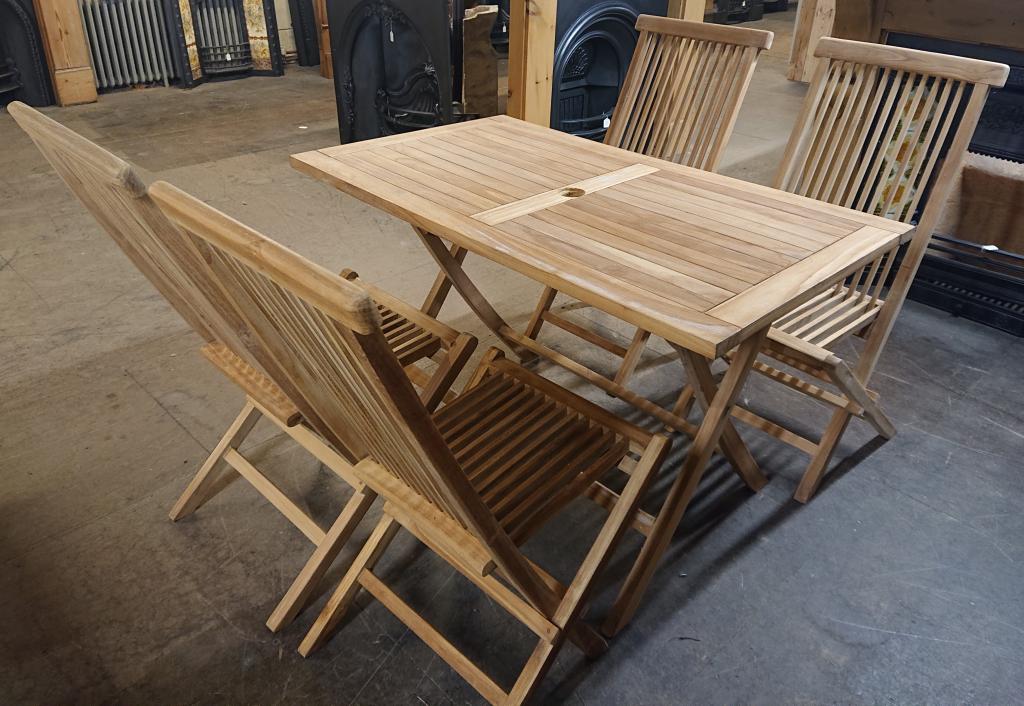 <p>Teak Table with 4 Chairs</p><p>Table 120 cm x 70 cm</p><p>Table and Chairs fold up</p>